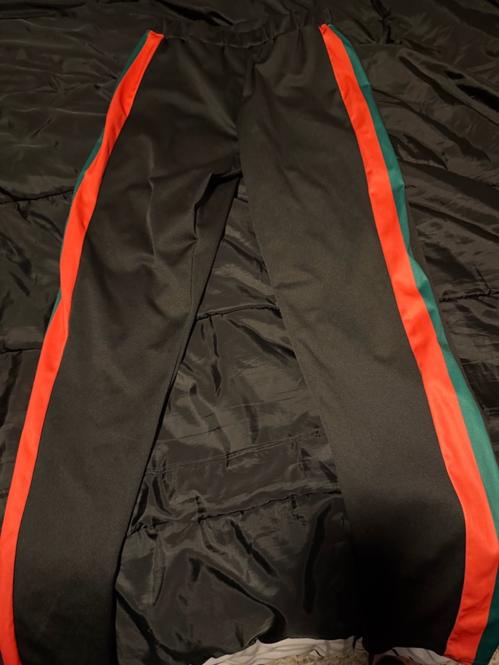Black Track Pants with Red and Teal Side Stripes
